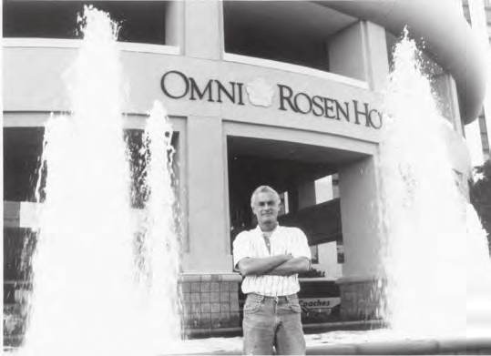 Harris Rosen in front of one of his seven hotels, 1996.